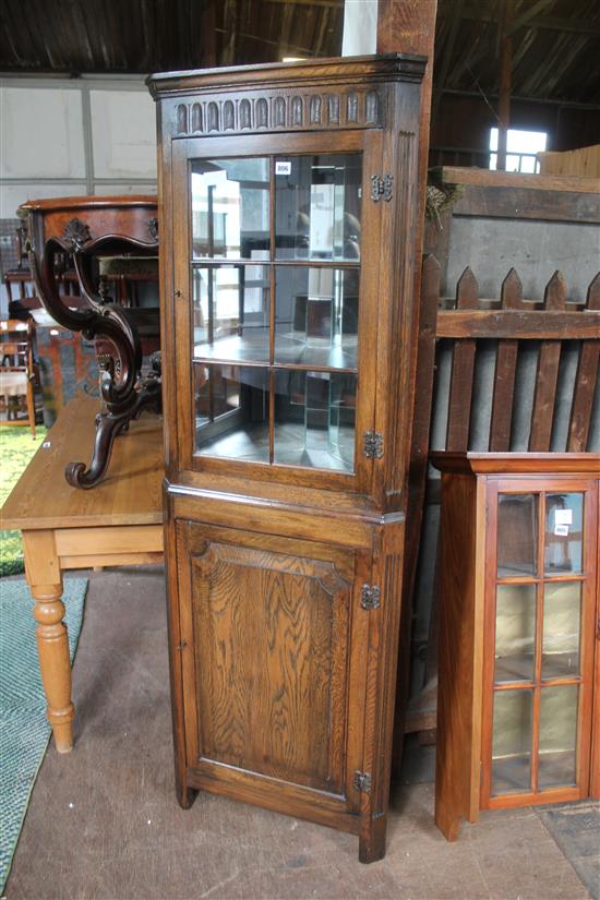 Glazed standing oak corner cabinet
